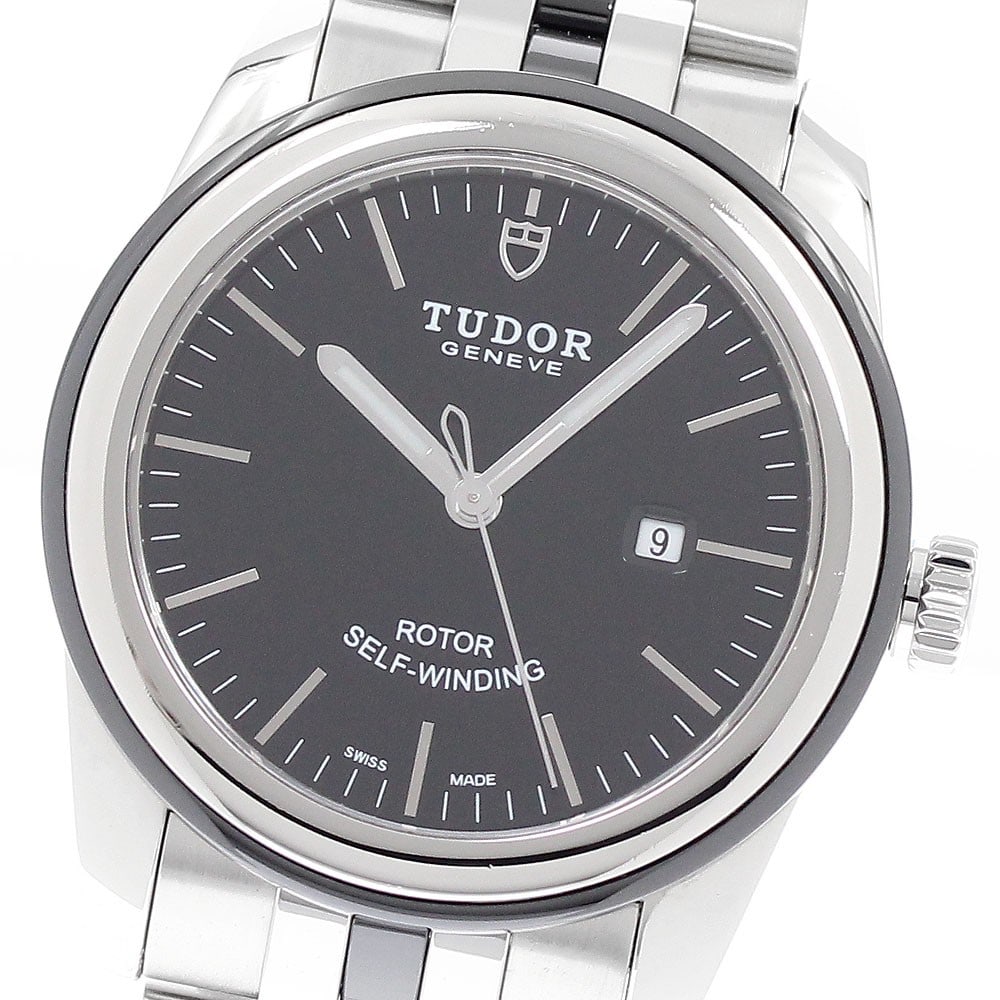 Tudor Glamour Date 53010 Women's Automatic Wristwatch: Tudor Glamour Date 53010 Women's Automatic Wristwatch This pre-owned Tudor Glamour Date ladies wristwatch features a stainless steel and ceramic case and band, complemented by a black dial with date d