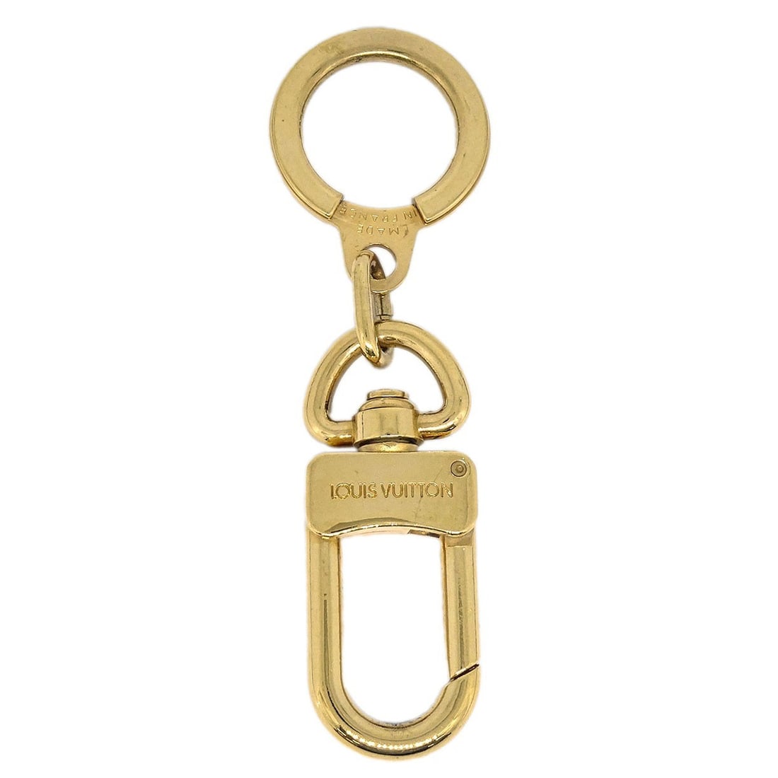 Anokre Gold Plated Keyring by Louis Vuitton M62694: Anokre Gold Plated Keyring by Louis Vuitton M62694 This Louis Vuitton Anokre bag charm and key holder features a gold-plated finish and is designed for unisex use. It offers a stylish way to accessori