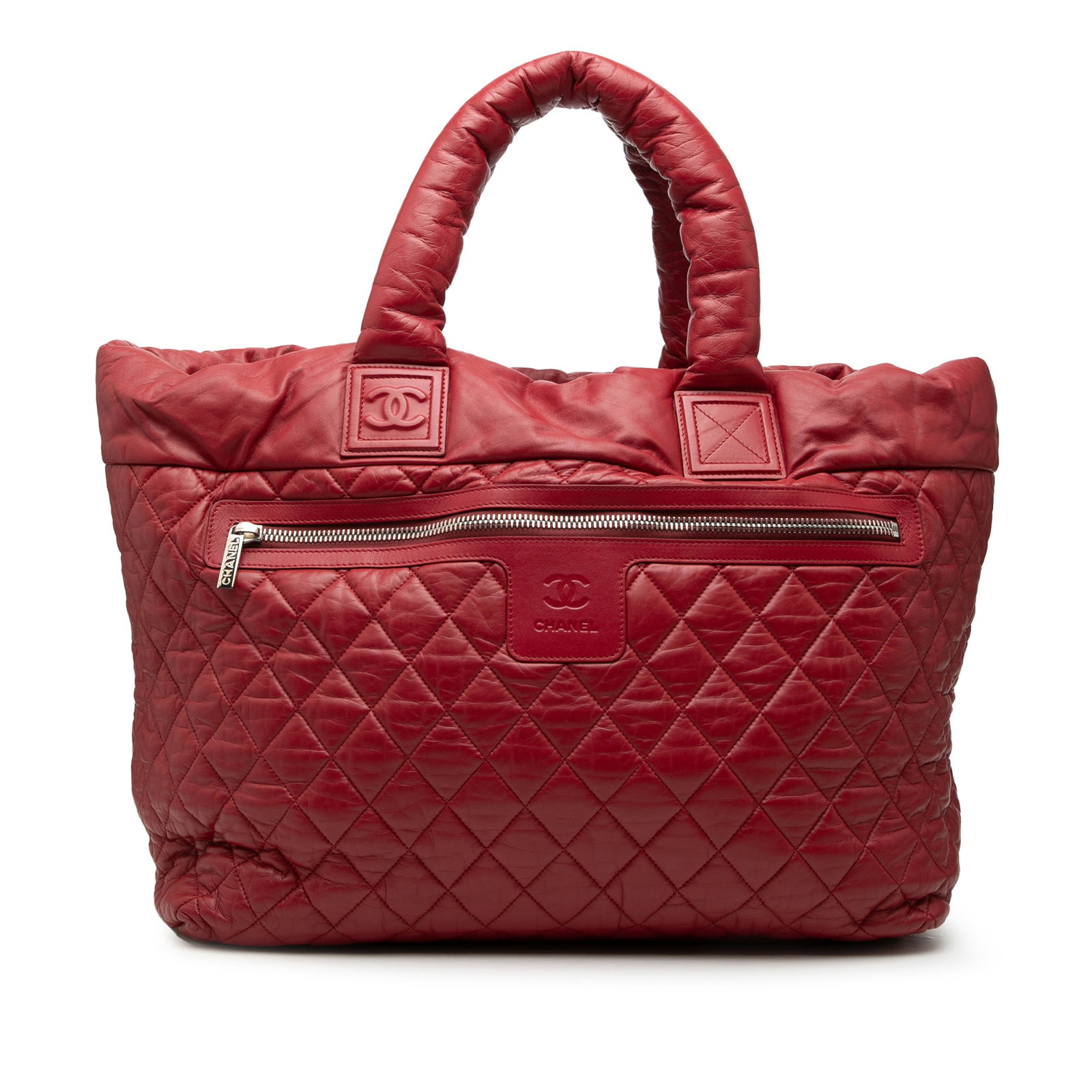 Reversible Coco Cocoon Tote Bag in Quilted Nylon by Chanel: Reversible Coco Cocoon Tote Bag in Quilted Nylon by Chanel This Chanel Large Quilted Nylon Reversible Coco Cocoon Tote features a nylon leather body with quilted detailing. The bag is designed with ro