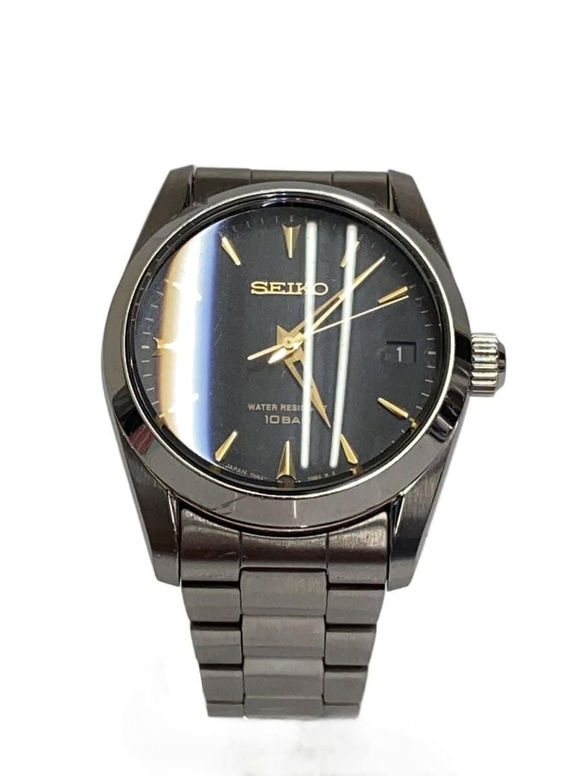 Seiko Men's Stainless Steel Quartz Watch Black Dial 7N42-HAP0: Seiko Men's Stainless Steel Quartz Watch Black Dial 7N42-HAP0 This SEIKO 7N42-HAP0 is a men's quartz wristwatch featuring a black dial and a stainless steel case and band. Made in Japan, it is designe