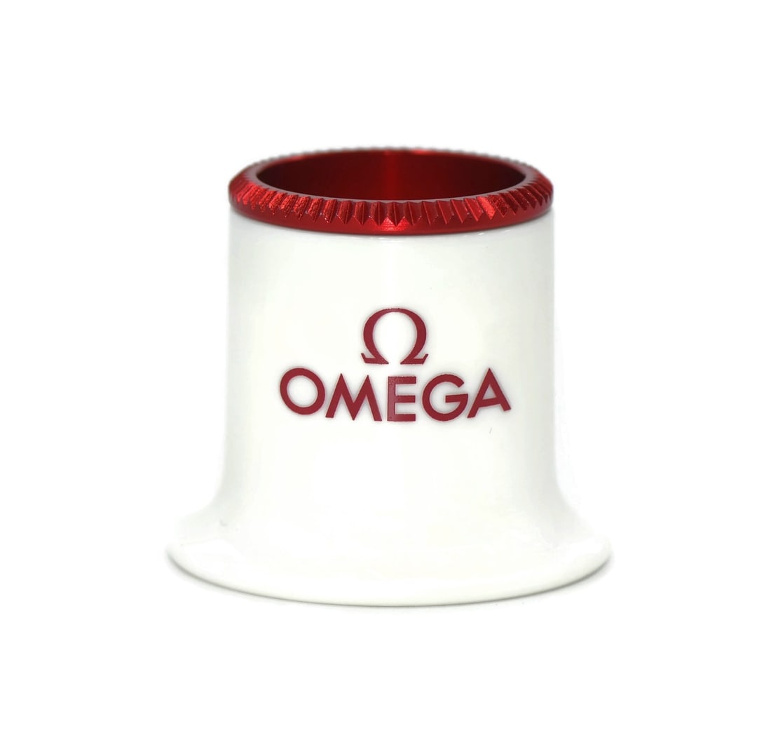 Loupe and Magnifier for Detailed Viewing Omega Speedmaster White: Loupe and Magnifier for Detailed Viewing Omega Speedmaster White This is an Omega Speedmaster white loupe, designed for magnification tasks. It is a pre-owned tool made in Switzerland, suitable for de