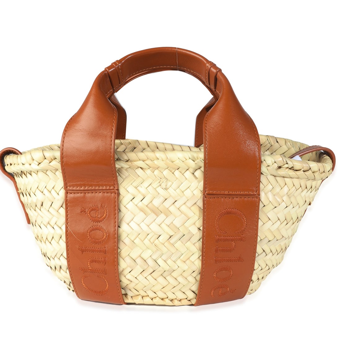 Small Sense Basket Shoulder Bag in Caramel Raffia and Calfskin by Chloe: Small Sense Basket Shoulder Bag in Caramel Raffia and Calfskin by Chloe This Chloe Small Sense Basket Bag features a beige and brown raffia exterior with smooth calfskin accents. Designed in Spain, it