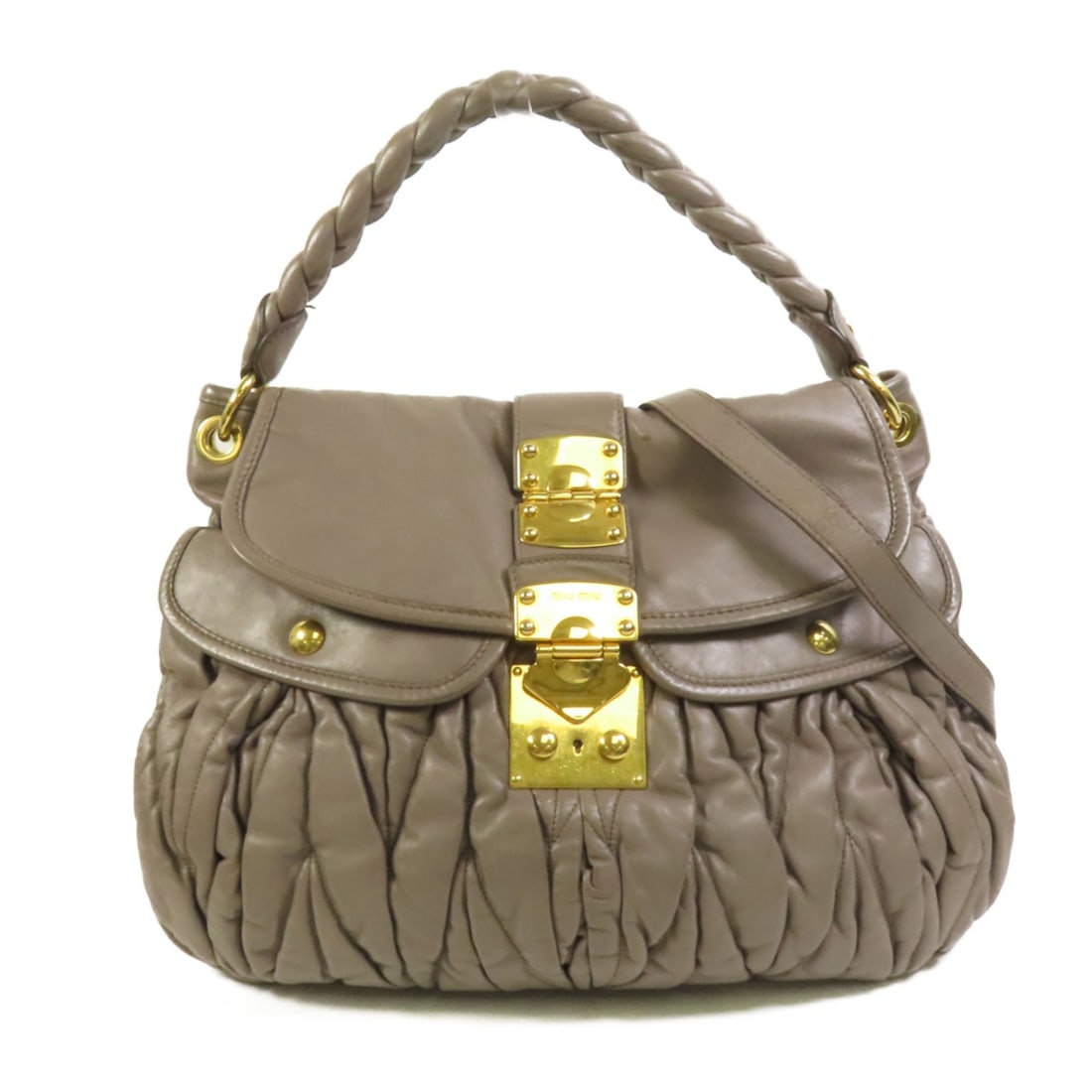 Miu Miu Grey Lambskin Convertible Shoulder Bag with Gold Hardware: Miu Miu Grey Lambskin Convertible Shoulder Bag with Gold Hardware This Miu Miu 2-way shoulder bag is crafted from luxurious lambskin leather in a stylish gray tone. Designed for versatility, it can be