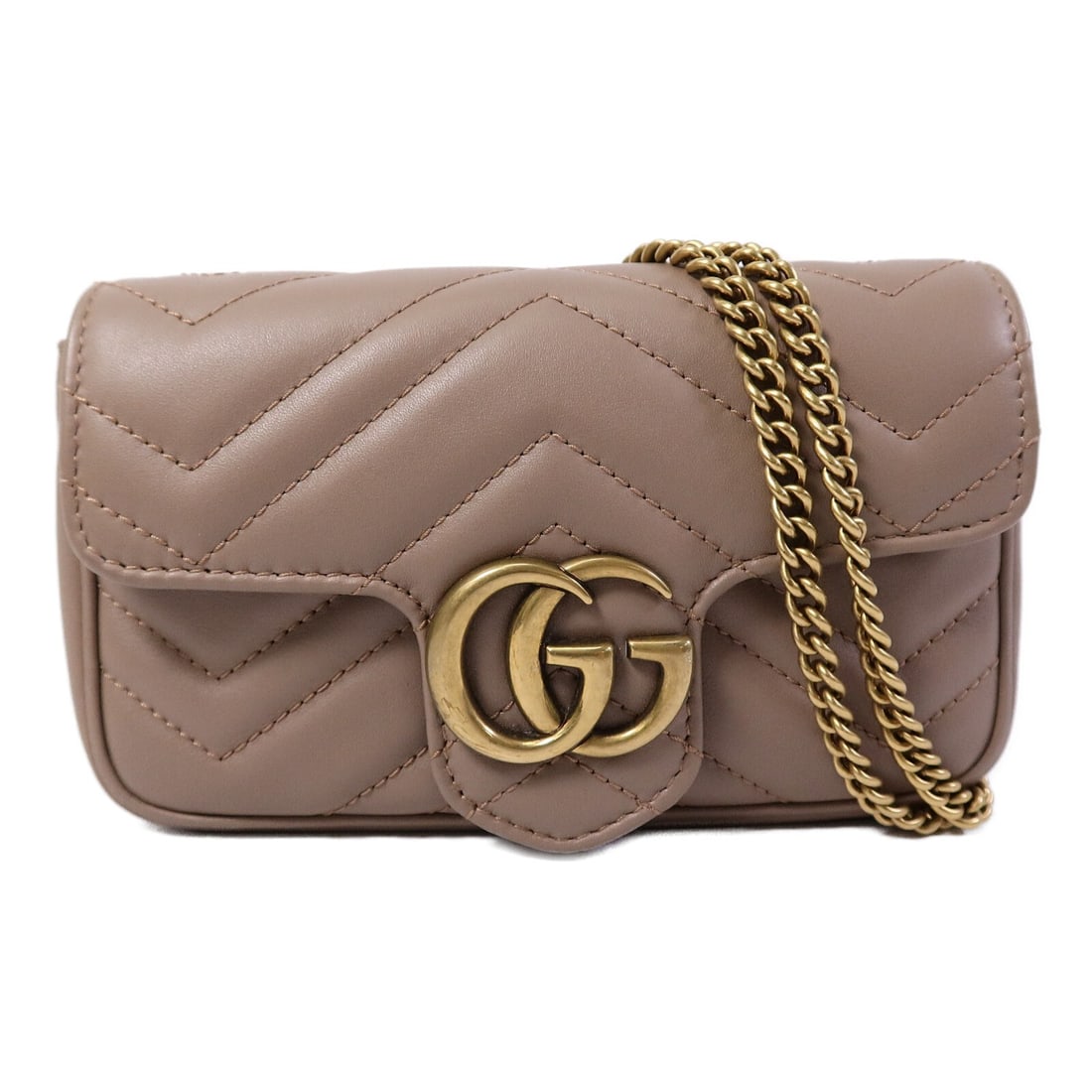 Gucci GG Marmont beige calfskin super mini shoulder bag: Gucci GG Marmont beige calfskin super mini shoulder bag This GUCCI GG Marmont Super Mini chain shoulder bag is crafted from beige calfskin leather and features a compact, elegant silhouette. Designed 