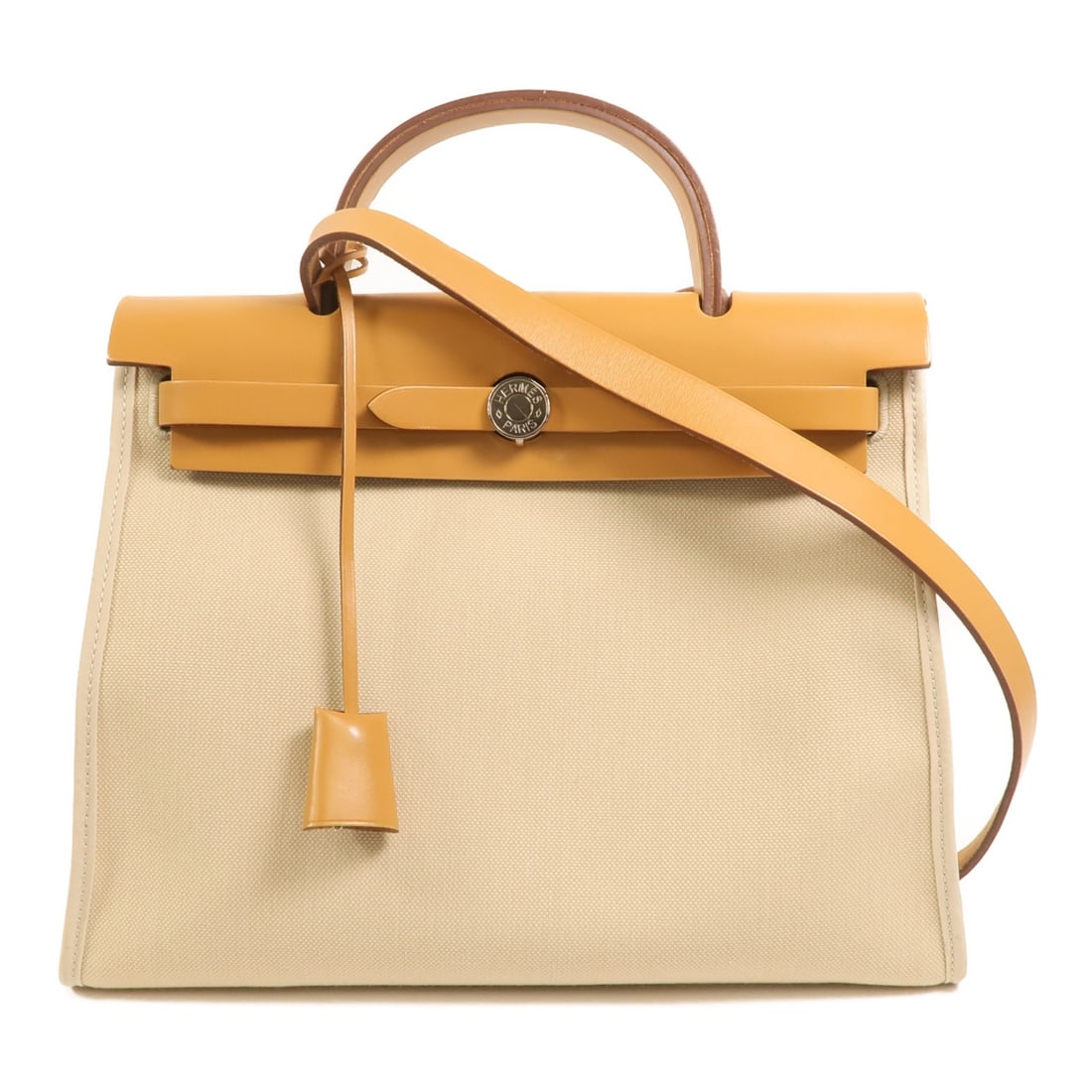 Herbag PM Canvas Shoulder Bag with SHW Beton Gray by Hermes: Herbag PM Canvas Shoulder Bag with SHW Beton Gray by Hermes This HERMES Herbag PM is a 2-way shoulder bag crafted from gray canvas. Designed for women, it features a versatile style that can be worn i