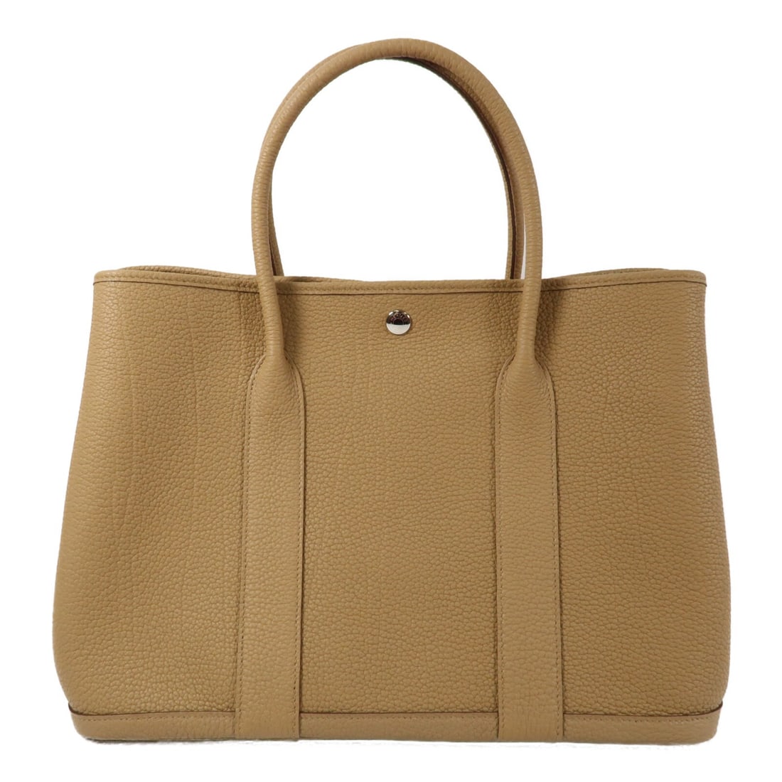 GardenParty PM brown Clemence leather tote with palladium hardware by Hermes: GardenParty PM brown Clemence leather tote with palladium hardware by Hermes This Hermes Garden Party PM tote bag is crafted from Taurillon Clemence calfskin leather in a biscuit brown shade. Designed