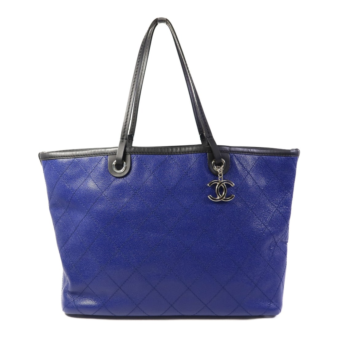 CHANEL Blue Cowhide Leather Tote Bag Handmade in France: CHANEL Blue Cowhide Leather Tote Bag Handmade in France This elegant CHANEL tote bag is crafted from premium blue calfskin (cowhide), showcasing a sleek and stylish design. The bag features a spacious