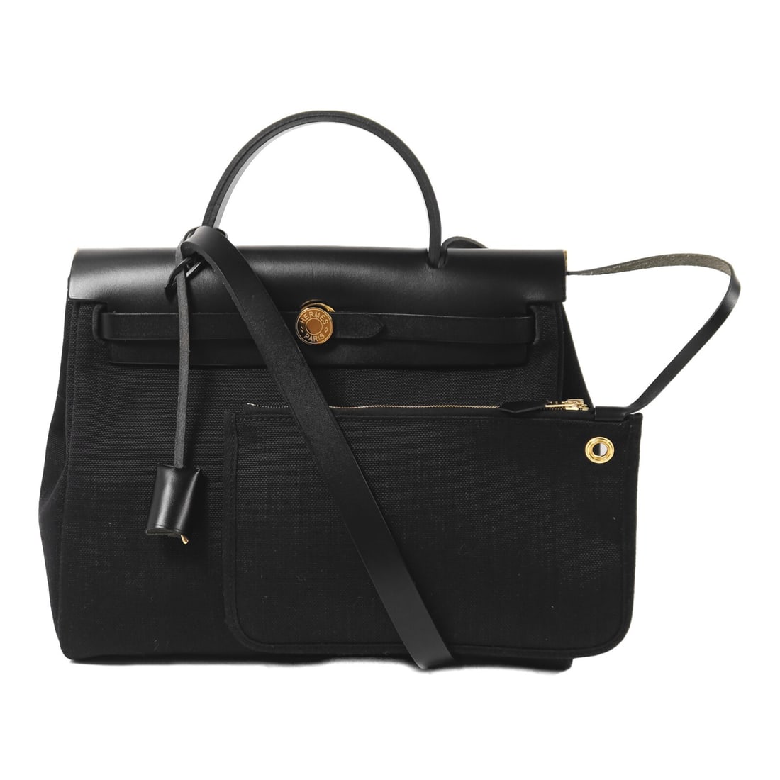 Herbag PM Black Canvas Shoulder Bag with Gold Hardware by Hermes: Herbag PM Black Canvas Shoulder Bag with Gold Hardware by Hermes This Hermes Herbag PM 2-way shoulder bag features a black canvas exterior and offers versatile carrying options. Made in France, it is 