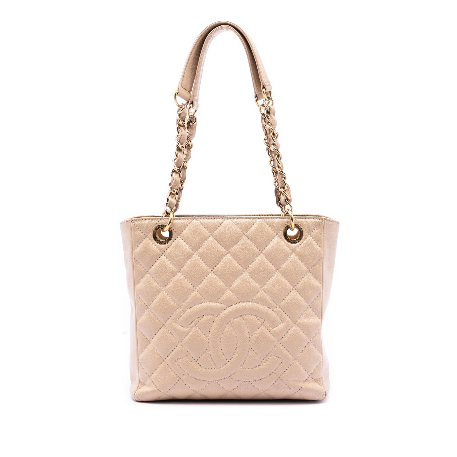 Chanel Beige Caviar Leather Petite Shopping Tote with Chain Handles: Chanel Beige Caviar Leather Petite Shopping Tote with Chain Handles This Chanel Caviar Petite Shopping Tote features a beige caviar leather body with a textured finish, curb chain handles, and an open