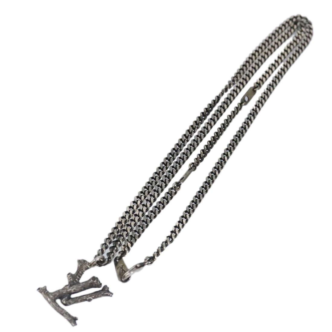 Louis Vuitton MP2818 Dark Silver Metal Necklace with Wood Accent: Louis Vuitton MP2818 Dark Silver Metal Necklace with Wood Accent This Louis Vuitton necklace features a dark silver metal design and offers a sleek, modern look. Crafted in Italy, it has a total lengt