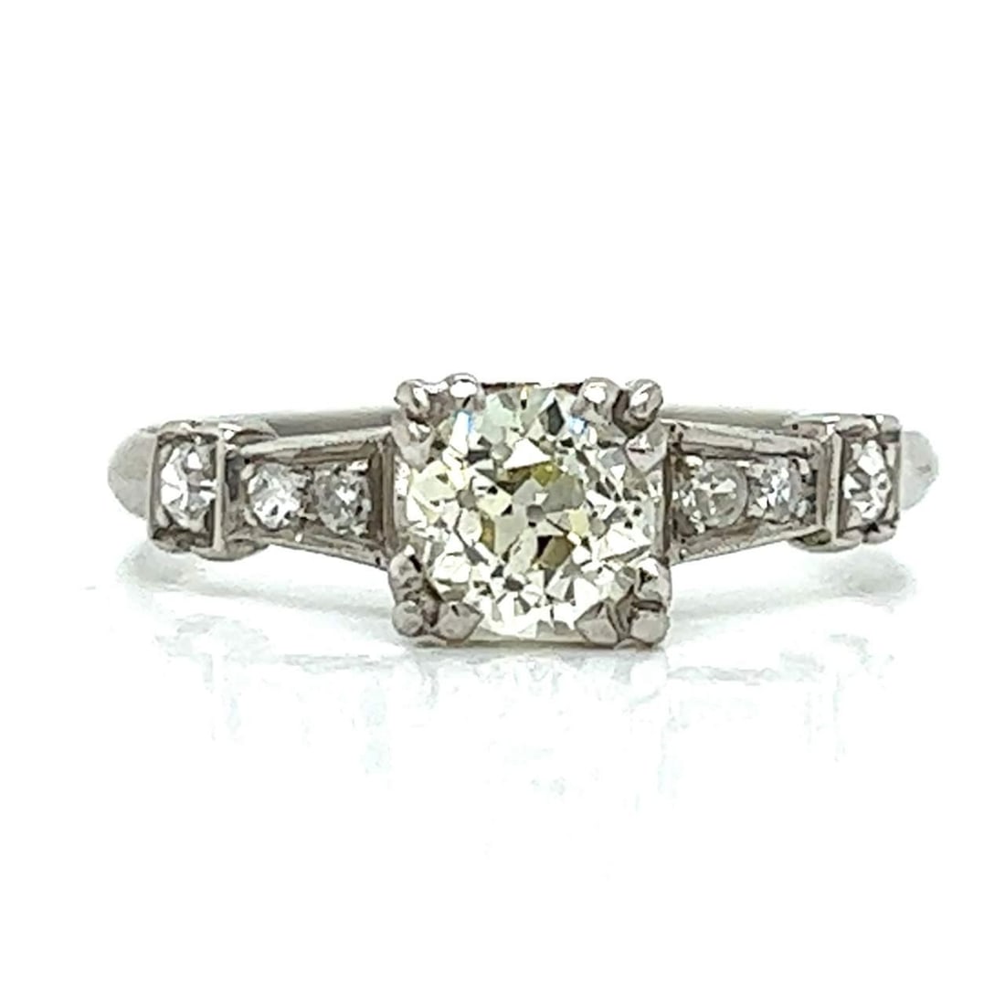 Art Deco Platinum Diamond Ring 1.00 Ct N SI2 with 6 Accent Stones: Art Deco Platinum Diamond Ring 1.00 Ct N SI2 with 6 Accent Stones This exquisite Art Deco ring features a stunning platinum setting with a primary diamond weighing approximately 1.00 Ct. The diamond e