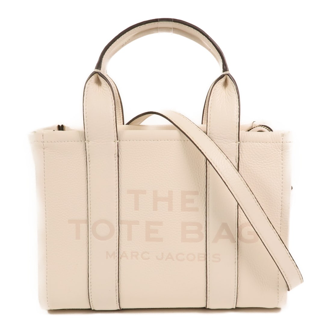 White Calfskin Marc Jacobs The Tote Bag Gold Hardware 2 Way Shoulder: White Calfskin Marc Jacobs The Tote Bag Gold Hardware 2 Way Shoulder This Marc Jacobs 2-way shoulder bag features a sophisticated design crafted from white calfskin leather. The bag offers versatile c