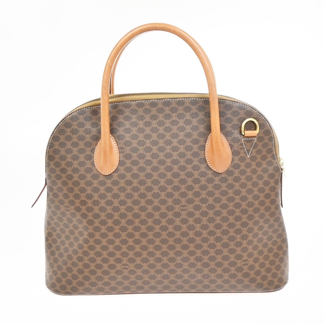 Celine Macadam Brown Canvas and Leather Vintage Handbag: Celine Macadam Brown Canvas and Leather Vintage Handbag This Celine Vintage Macadam handbag is crafted from canvas with leather accents in a brown color. Designed for women, it features the signature 