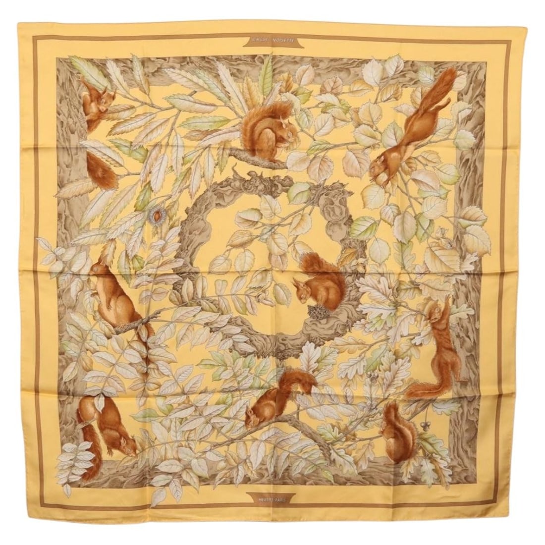 Silk Yellow Carre 90 Casse Noisette Scarf for Women by Hermes: Silk Yellow Carre 90 Casse Noisette Scarf for Women by Hermes This HERMES Carre 90 "CASSE NOISETTE" scarf features a vibrant yellow silk material and showcases the iconic design in a classic 90 cm squ