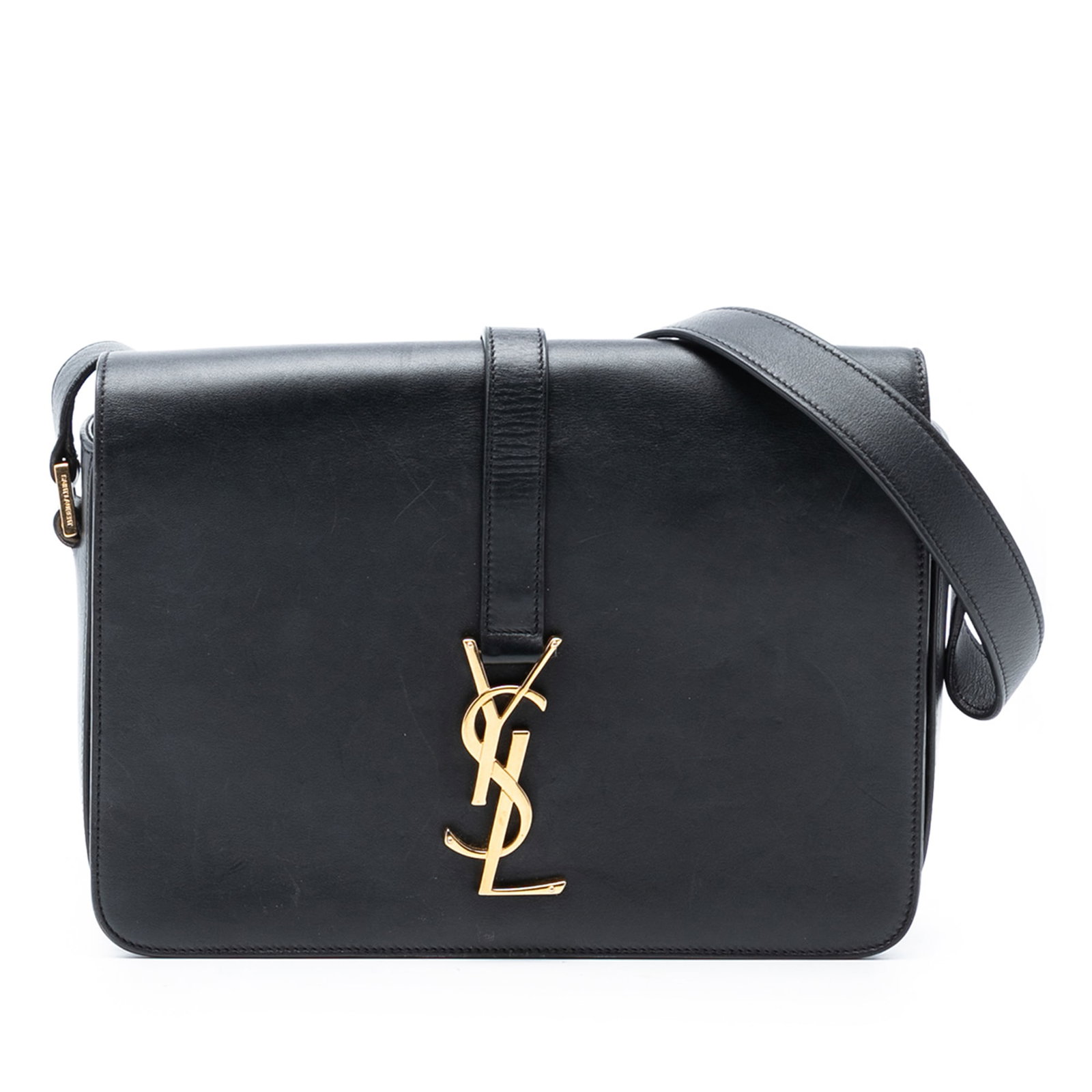 Black Leather Universite Medium Shoulder Bag by Saint Laurent: Black Leather Universite Medium Shoulder Bag by Saint Laurent This Saint Laurent Medium Leather Monogram Universite Bag features a black leather body with an adjustable flat leather shoulder strap. Th