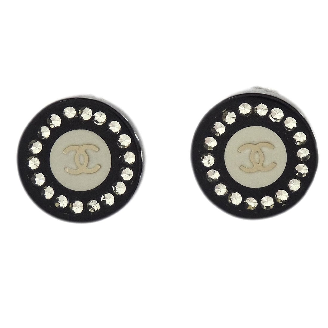 Chanel 08C Round Black Rhinestone Acrylic Clip-On Earrings: Chanel 08C Round Black Rhinestone Acrylic Clip-On Earrings These Chanel round button-style earrings feature a classic clip-on closure and are crafted from acrylic with rhinestone embellishments and si