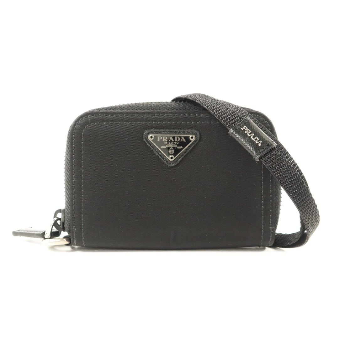 Prada Black Nylon Card Holder with Strap Silver Hardware: Prada Black Nylon Card Holder with Strap Silver Hardware This Prada card case features a sleek black nylon exterior and includes a convenient strap for easy carrying. Designed for unisex use, it offer