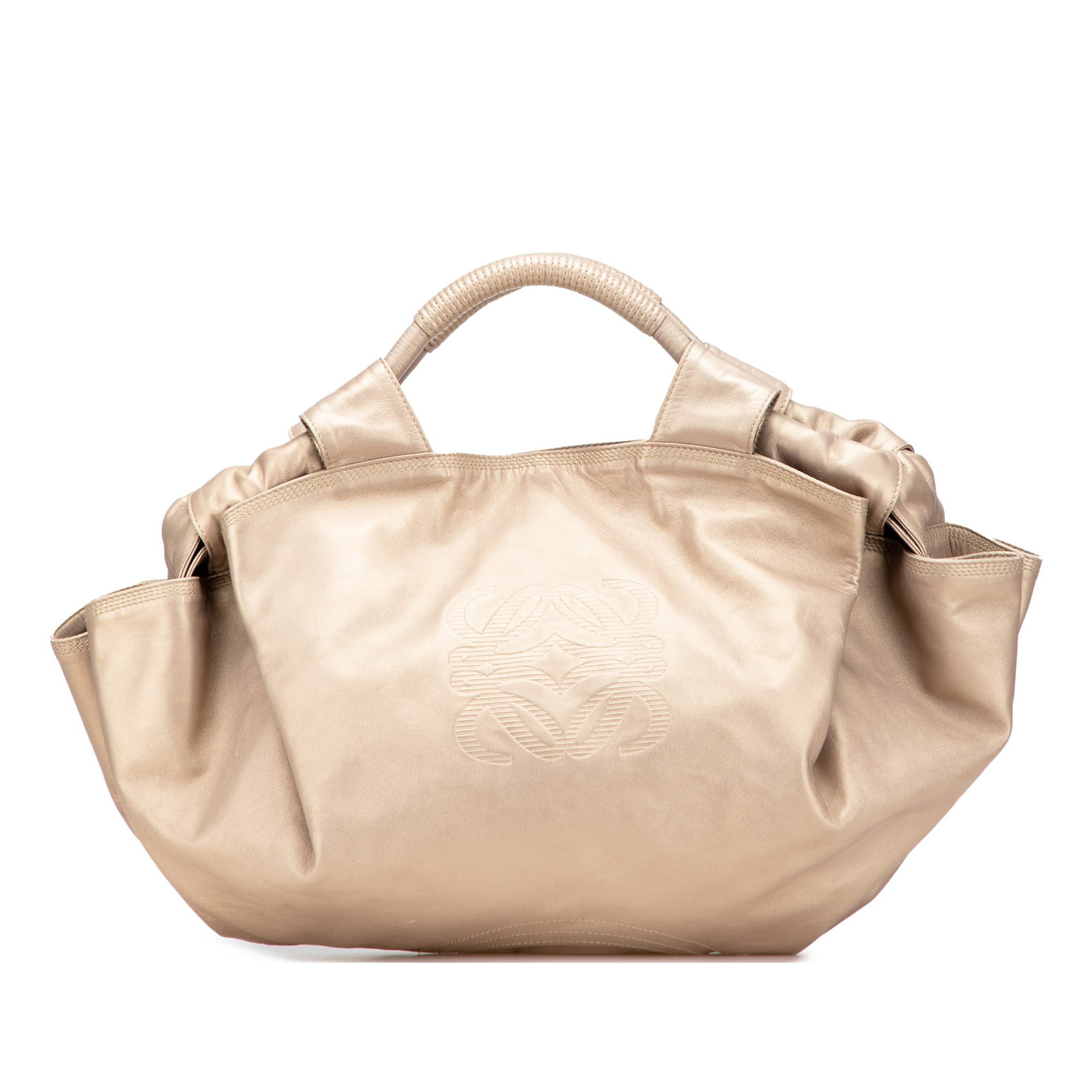 LOEWE Nappa Aire Gold Leather Handbag with Magnetic Closure: LOEWE Nappa Aire Gold Leather Handbag with Magnetic Closure Introducing the LOEWE Nappa Aire, a luxurious bag crafted from premium nappa leather. This stylish accessory features rolled leather handles
