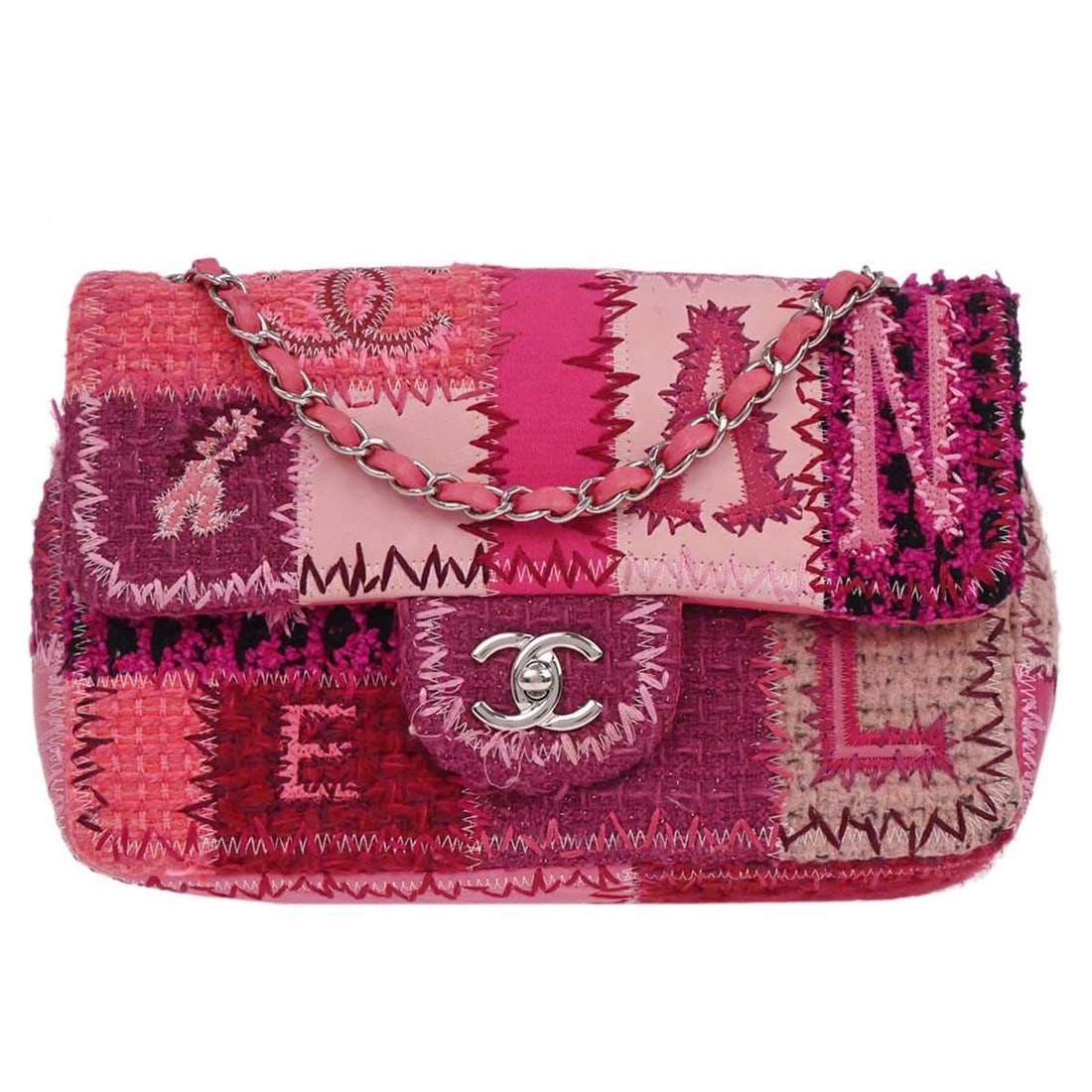 Chanel Medium Pink Tweed and Leather Shoulder Bag with Logo Accent: Chanel Medium Pink Tweed and Leather Shoulder Bag with Logo Accent This Chanel shoulder bag features a stylish pink tweed patchwork design with leather exterior accents and iconic logo detailing. Desi