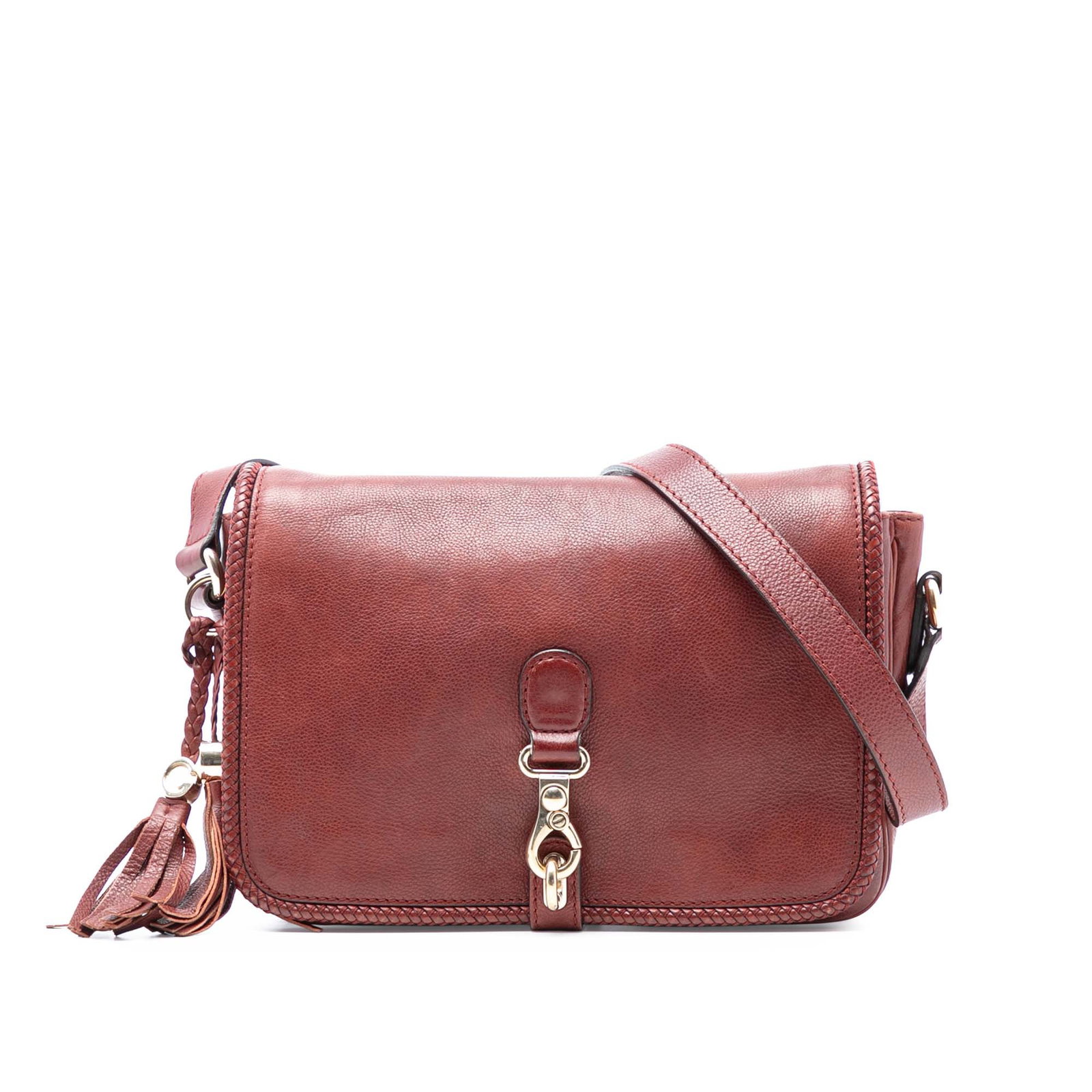 Red Leather Marrakech Crossbody Bag with Tassel and Flap by Gucci: Red Leather Marrakech Crossbody Bag with Tassel and Flap by Gucci This Gucci Marrakech crossbody bag features a red leather body with a tassel detail, an adjustable flat strap, and a front flap with c