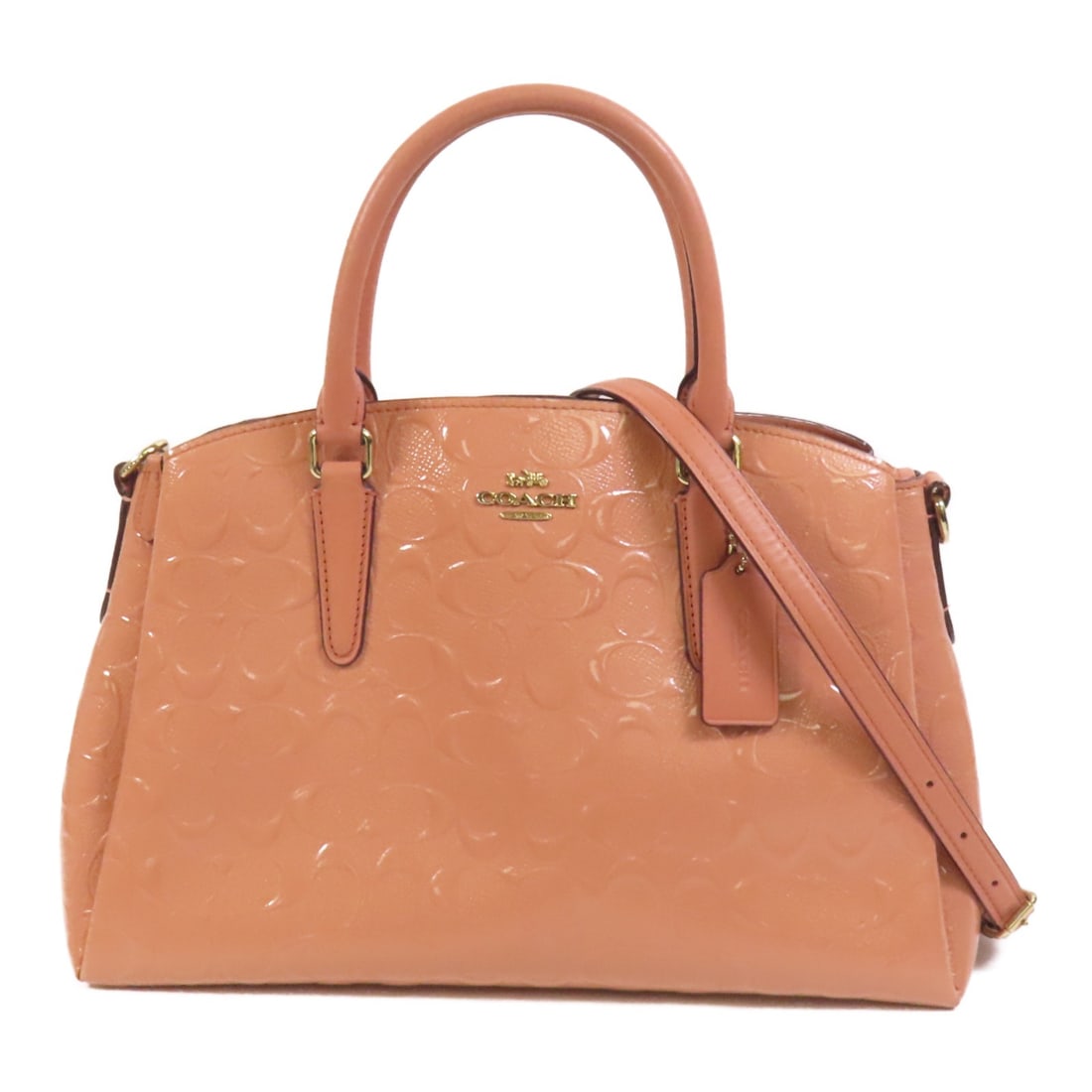 Pink Patent Leather Coach Shoulder Bag with Chain and Gold Hardware: Pink Patent Leather Coach Shoulder Bag with Chain and Gold Hardware This COACH 2-way chain shoulder bag features glossy pink patent leather and can be carried as either a shoulder or handheld bag. The