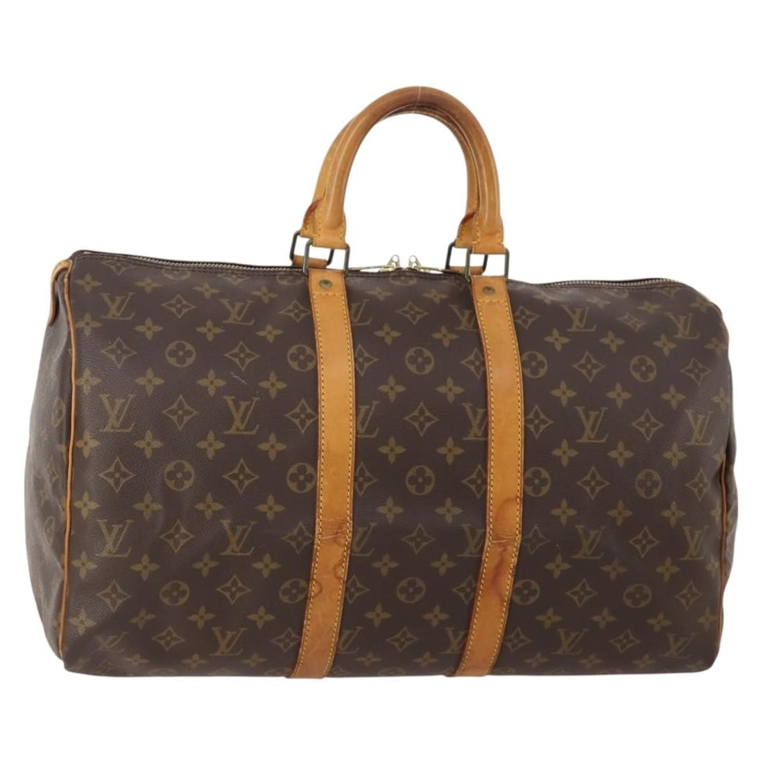Louis Vuitton Monogram Canvas Keepall Travel Duffel Bag Brown Unisex: Louis Vuitton Monogram Canvas Keepall Travel Duffel Bag Brown Unisex This Louis Vuitton Keepall bag in classic Monogram canvas offers a spacious and versatile design suitable for unisex use. The brown