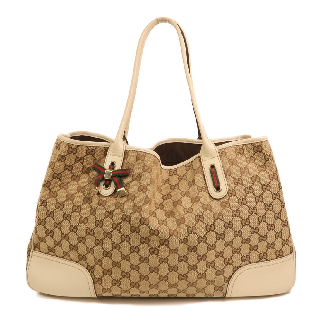 Brown GG Canvas Gucci Shoulder Bag with Gold Hardware: Brown GG Canvas Gucci Shoulder Bag with Gold Hardware This Gucci GG shoulder bag features the signature GG canvas in brown, complemented by gold-tone hardware. Designed for women, it offers ample spac