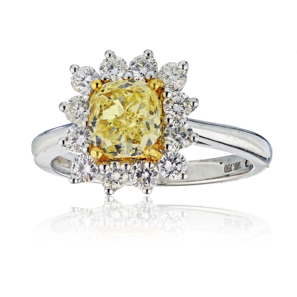 1.21 Carat GIA Radiant Cut Fancy Yellow Diamond Engagement Ring 18K White Gold: 1.21 Carat GIA Radiant Cut Fancy Yellow Diamond Engagement Ring 18K White Gold This exquisite engagement ring features a stunning 1.21 carat Radiant Cut Fancy Yellow diamond, certified by GIA. Set in 