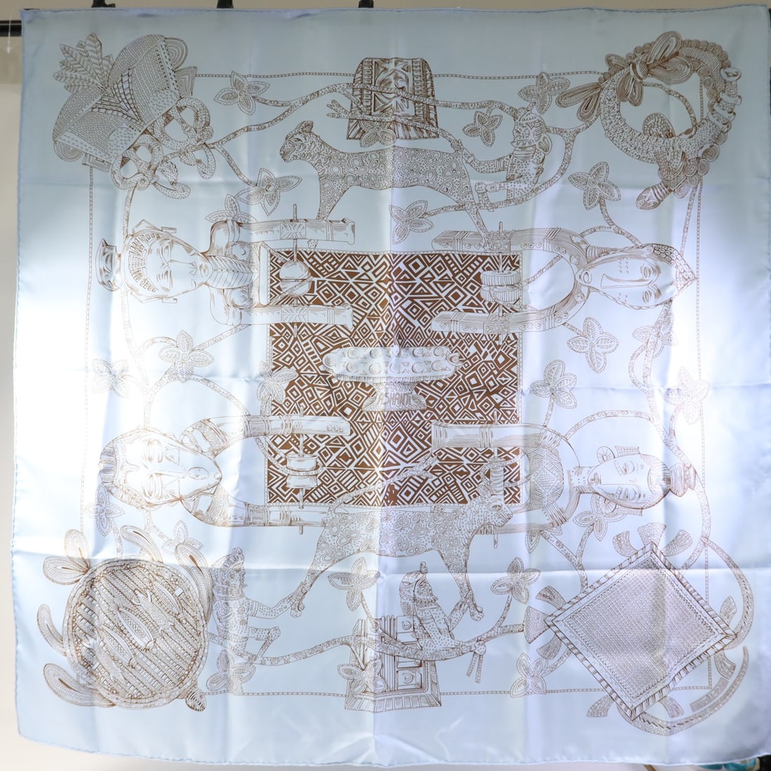Silk Blue Scarf from Hermes for Women Made in France: Silk Blue Scarf from Hermes for Women Made in France This Hermes women's scarf is crafted from luxurious silk and features a striking blue color. Made in France, it offers both elegance and timeless s