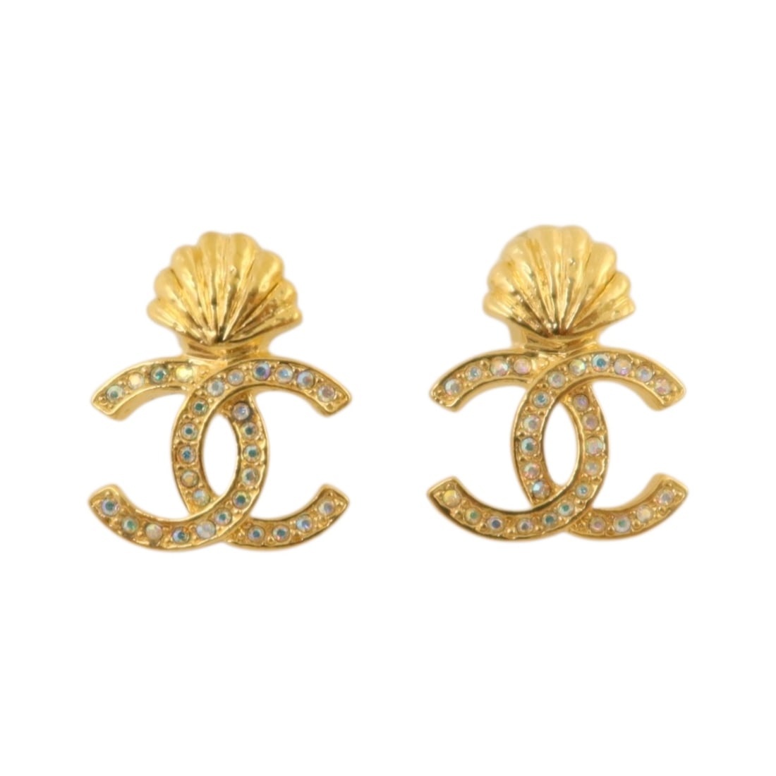 Gold Tone Pierced Earrings with CC Logo by CHANEL: Gold Tone Pierced Earrings with CC Logo by CHANEL These CHANEL CC pierced earrings feature a gold-tone metal finish and the iconic CC logo design. Crafted in France, they are designed for women and do