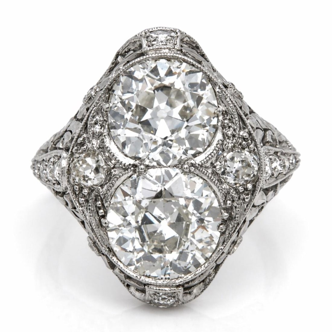 Platinum Art Deco Ring with 4.60 Carats Old Mine Diamonds: Platinum Art Deco Ring with 4.60 Carats Old Mine Diamonds This Art Deco platinum ring features two Old Mine cut diamonds with a total weight of approximately 4.00 carats, displaying H-I color and VS1-