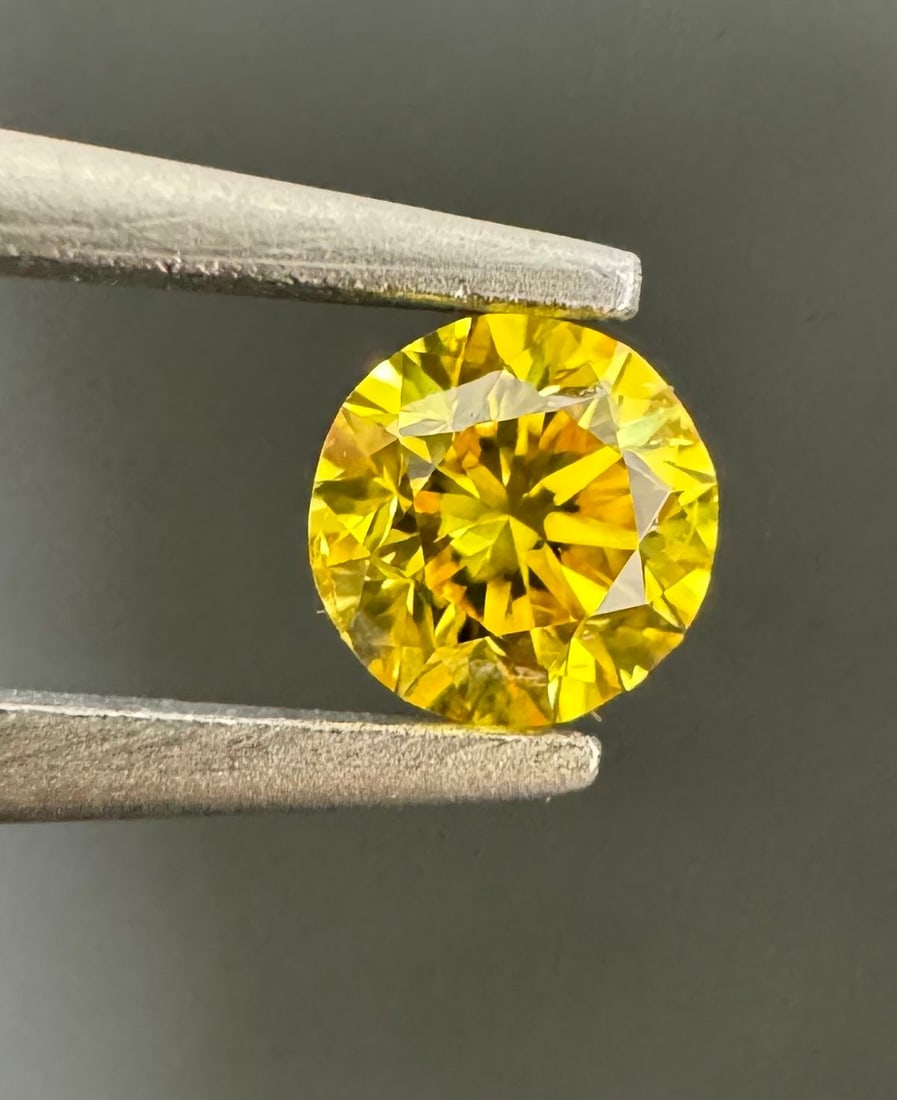 Loose Diamond - ROUND 0.2ct Fancy Vivid Yellow I1: Loose Diamond - ROUND 0.2ct Fancy Vivid Yellow I1 Source: Natural Shape: ROUND Carats: 0.2 Color: Fancy Vivid Yellow Certification: GIA Video: