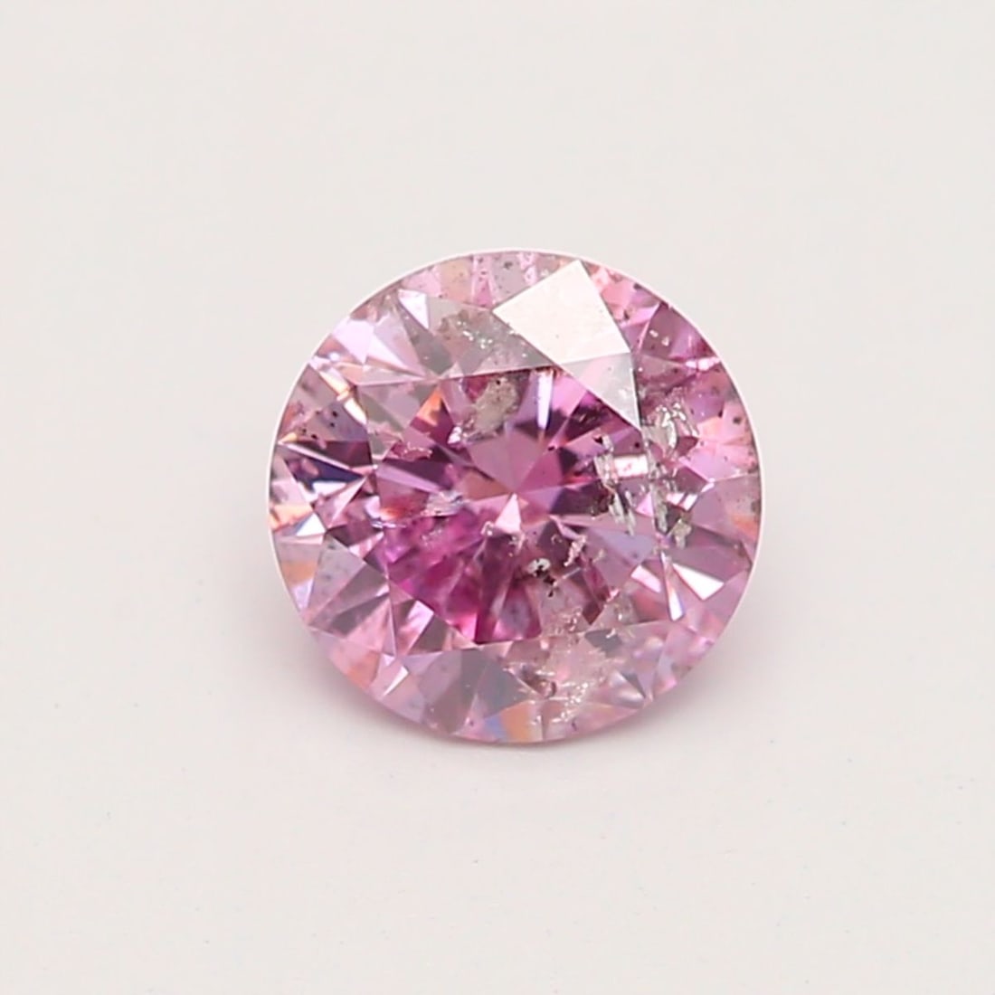 Loose Diamond - ROUND 0.31ct Fancy Intense Purplish Pink: Loose Diamond - ROUND 0.31ct Fancy Intense Purplish Pink Source: Natural Shape: ROUND Carats: 0.31 Color: Fancy Intense Purplish Pink Certification: GIA PLEASE NOTE: Framed, Large, or heavy items do n