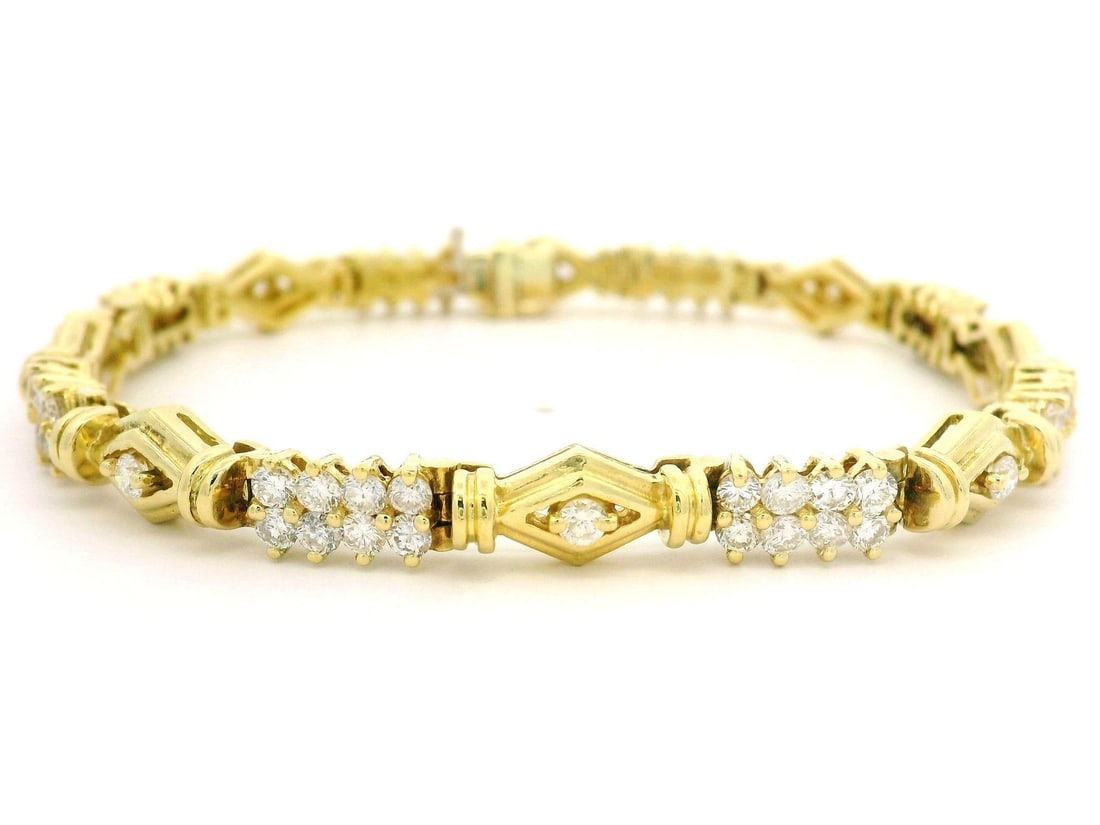 18K Yellow Gold 3.24ctw Diamond Geometric Line Bracelet: 18K Yellow Gold 3.24ctw Diamond Geometric Line Bracelet This exquisite 18k Yellow Gold Geometric Line Bracelet features a stunning collection of (72) natural genuine diamonds, each showcasing a brilli