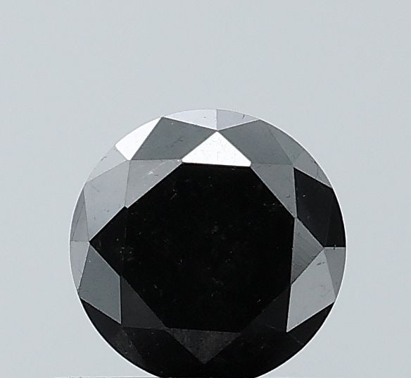Loose Diamond - ROUND 0.64ct Fancy Black VVS2: Loose Diamond - ROUND 0.64ct Fancy Black VVS2 Source: Natural Shape: ROUND Carats: 0.64 Color: Fancy Black Certification: NONE Video: