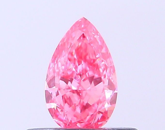 Loose Diamond - PEAR 0.36ct Fancy Vivid Pink VS1: Loose Diamond - PEAR 0.36ct Fancy Vivid Pink VS1 Source: This is a real non-mined Diamond that has been grown in a lab Shape: PEAR Carats: 0.36 Color: Fancy Vivid Pink Certification: IGI Video: