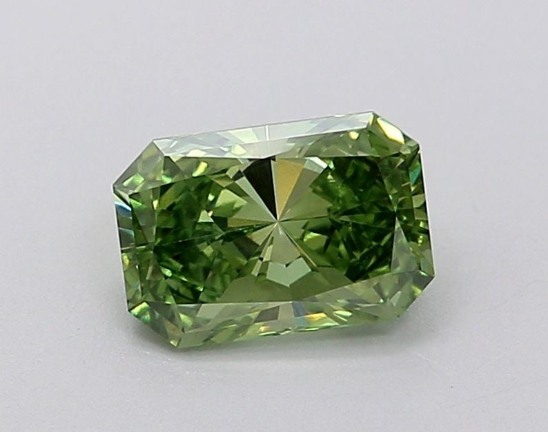 Loose Diamond - RADIANT 0.79ct Fancy Vivid Green VS1: Loose Diamond - RADIANT 0.79ct Fancy Vivid Green VS1 Source: This is a real non-mined Diamond that has been grown in a lab Shape: RADIANT Carats: 0.79 Color: Fancy Vivid Green Certification: IGI Video