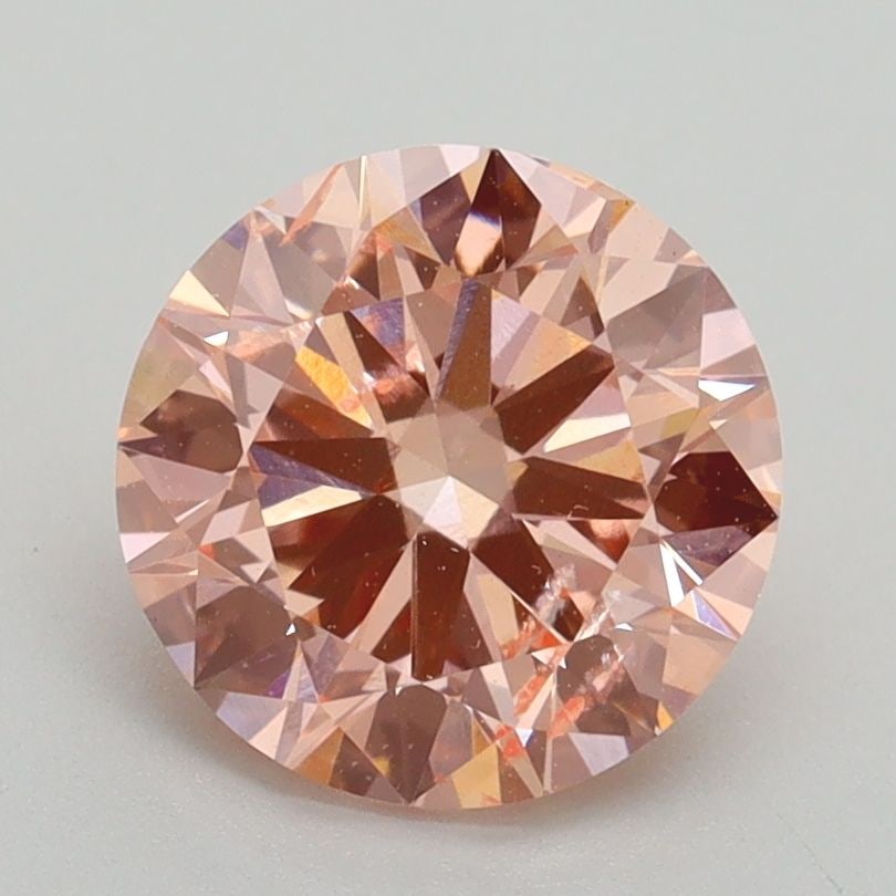 Loose Diamond - ROUND 2.0ct Fancy Intense Pink SI2: Loose Diamond - ROUND 2.0ct Fancy Intense Pink SI2 Source: This is a real non-mined Diamond that has been grown in a lab Shape: ROUND Carats: 2.0 Color: Fancy Intense Pink Certification: IGI Video: