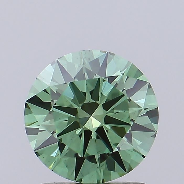 Loose Diamond - ROUND 1.46ct Fancy Vivid Green VS2: Loose Diamond - ROUND 1.46ct Fancy Vivid Green VS2 Source: This is a real non-mined Diamond that has been grown in a lab Shape: ROUND Carats: 1.46 Color: Fancy Vivid Green Certification: IGI Video: