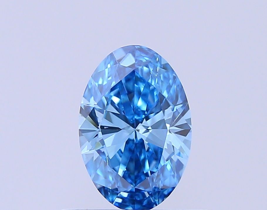 Loose Diamond - OVAL 0.53ct Fancy Blue VS2: Loose Diamond - OVAL 0.53ct Fancy Blue VS2 Source: This is a real non-mined Diamond that has been grown in a lab Shape: OVAL Carats: 0.53 Color: Fancy Blue Certification: NONE Video: