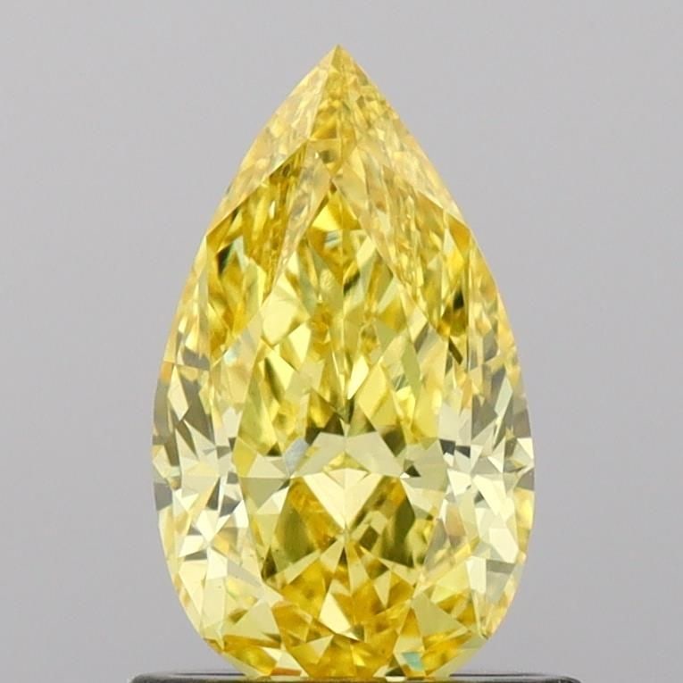 Loose Diamond - PEAR 0.87ct Fancy Vivid Yellow VS1: Loose Diamond - PEAR 0.87ct Fancy Vivid Yellow VS1 Source: This is a real non-mined Diamond that has been grown in a lab Shape: PEAR Carats: 0.87 Color: Fancy Vivid Yellow Certification: IGI Video: