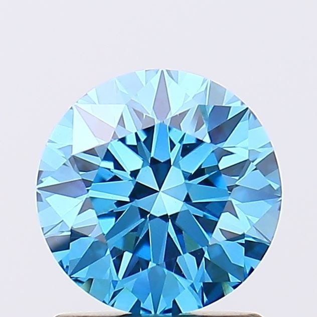 Loose Diamond - ROUND 1.32ct Fancy Vivid Blue VVS2: Loose Diamond - ROUND 1.32ct Fancy Vivid Blue VVS2 Source: This is a real non-mined Diamond that has been grown in a lab Shape: ROUND Carats: 1.32 Color: Fancy Vivid Blue Certification: IGI Video: