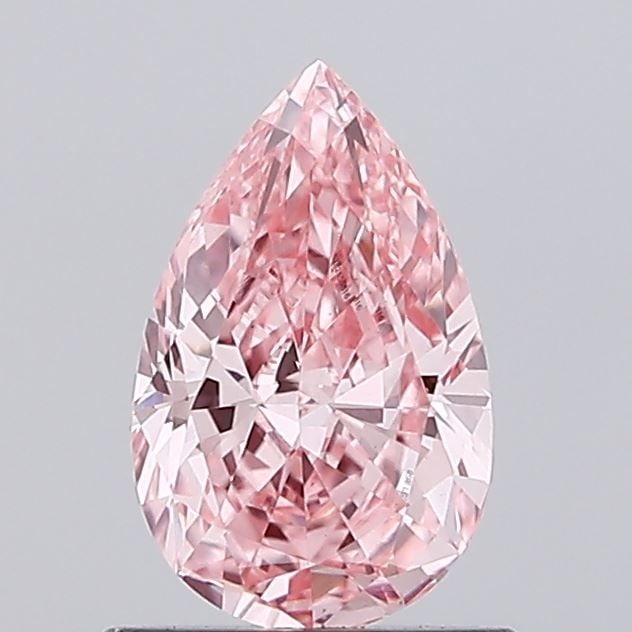Loose Diamond - PEAR 0.94ct Fancy Vivid Pink VS1: Loose Diamond - PEAR 0.94ct Fancy Vivid Pink VS1 Source: This is a real non-mined Diamond that has been grown in a lab Shape: PEAR Carats: 0.94 Color: Fancy Vivid Pink Certification: IGI Video: