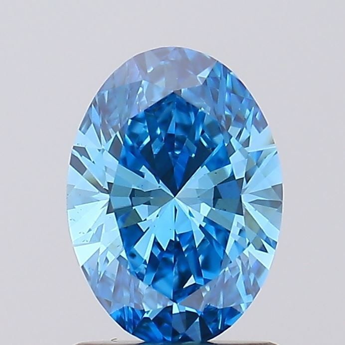 Loose Diamond - OVAL 1.08ct Fancy Vivid Blue VS1: Loose Diamond - OVAL 1.08ct Fancy Vivid Blue VS1 Source: This is a real non-mined Diamond that has been grown in a lab Shape: OVAL Carats: 1.08 Color: Fancy Vivid Blue Certification: IGI Video: