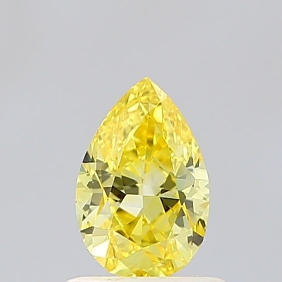 Loose Diamond - PEAR 1.0ct Fancy Vivid Yellow VS1: Loose Diamond - PEAR 1.0ct Fancy Vivid Yellow VS1 Source: This is a real non-mined Diamond that has been grown in a lab Shape: PEAR Carats: 1.0 Color: Fancy Vivid Yellow Certification: IGI Video: