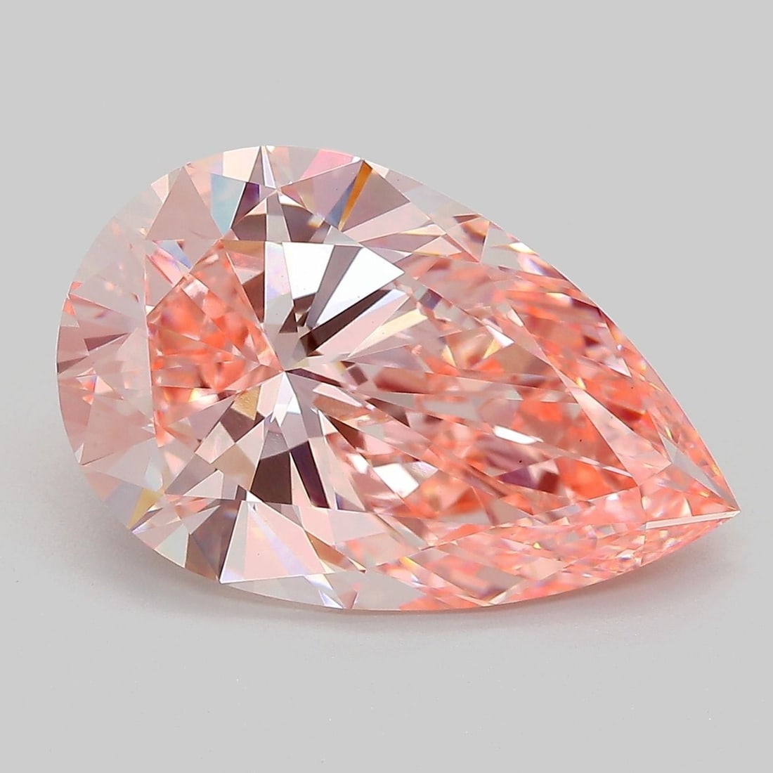 Loose Diamond - PEAR 7.05ct Fancy Vivid Pink VS1: Loose Diamond - PEAR 7.05ct Fancy Vivid Pink VS1 Source: This is a real non-mined Diamond that has been grown in a lab Shape: PEAR Carats: 7.05 Color: Fancy Vivid Pink Certification: IGI Video: