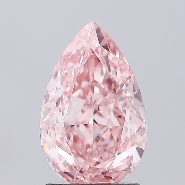 Loose Diamond - PEAR 1.56ct Fancy Vivid Pink VVS2: Loose Diamond - PEAR 1.56ct Fancy Vivid Pink VVS2 Source: This is a real non-mined Diamond that has been grown in a lab Shape: PEAR Carats: 1.56 Color: Fancy Vivid Pink Certification: IGI Video: