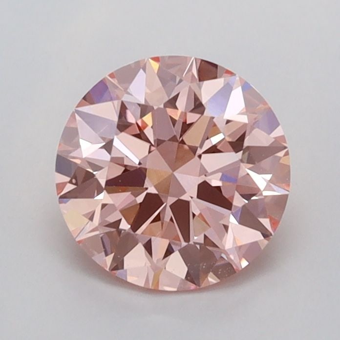 Ideal Loose Diamond - ROUND 1.03ct Fancy Vivid Pink VVS2: Ideal Loose Diamond - ROUND 1.03ct Fancy Vivid Pink VVS2 Source: This is a real non-mined Diamond that has been grown in a lab Shape: ROUND Carats: 1.03 Color: Fancy Vivid Pink Certification: IGI
