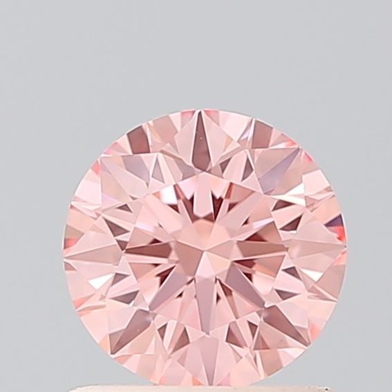 Ideal Loose Diamond - ROUND 0.73ct Fancy Vivid Pink VVS2: Ideal Loose Diamond - ROUND 0.73ct Fancy Vivid Pink VVS2 Source: This is a real non-mined Diamond that has been grown in a lab Shape: ROUND Carats: 0.73 Color: Fancy Vivid Pink Certification: IGI Vide