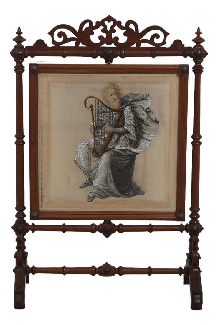 Victorian Walnut Rotating Fireplace Screen with Beaded Needlepoint: Victorian Walnut Rotating Fireplace Screen with Beaded Needlepoint This American Victorian rotating fireplace screen dates from circa 1860-1880 and features a finely carved walnut frame with tradition